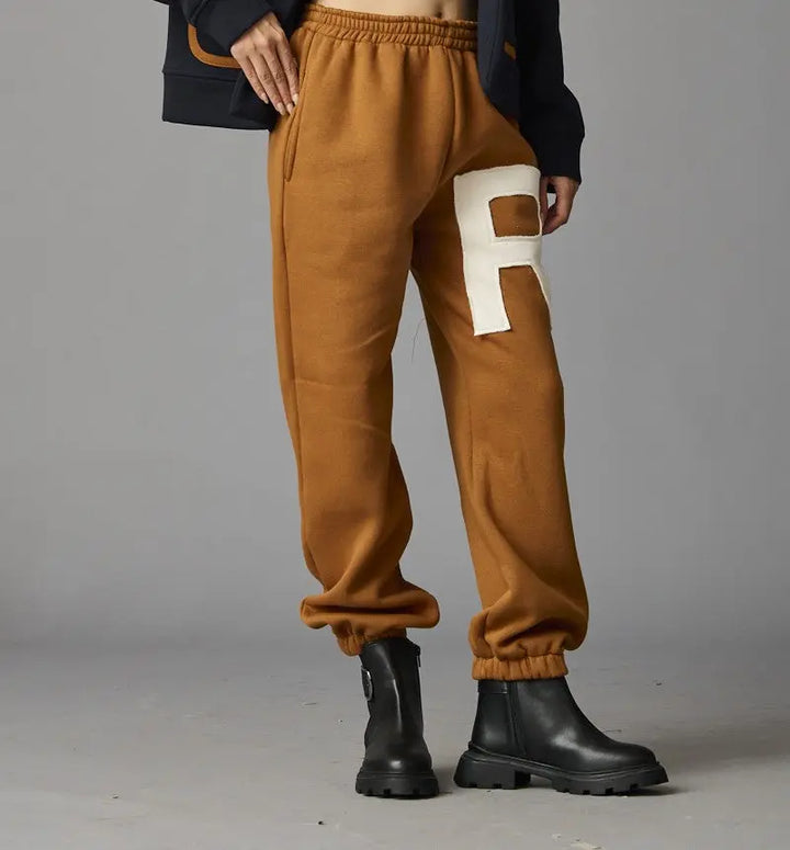 Risate women's luxury co-ord set featuring stylish brown joggers with letter detail
