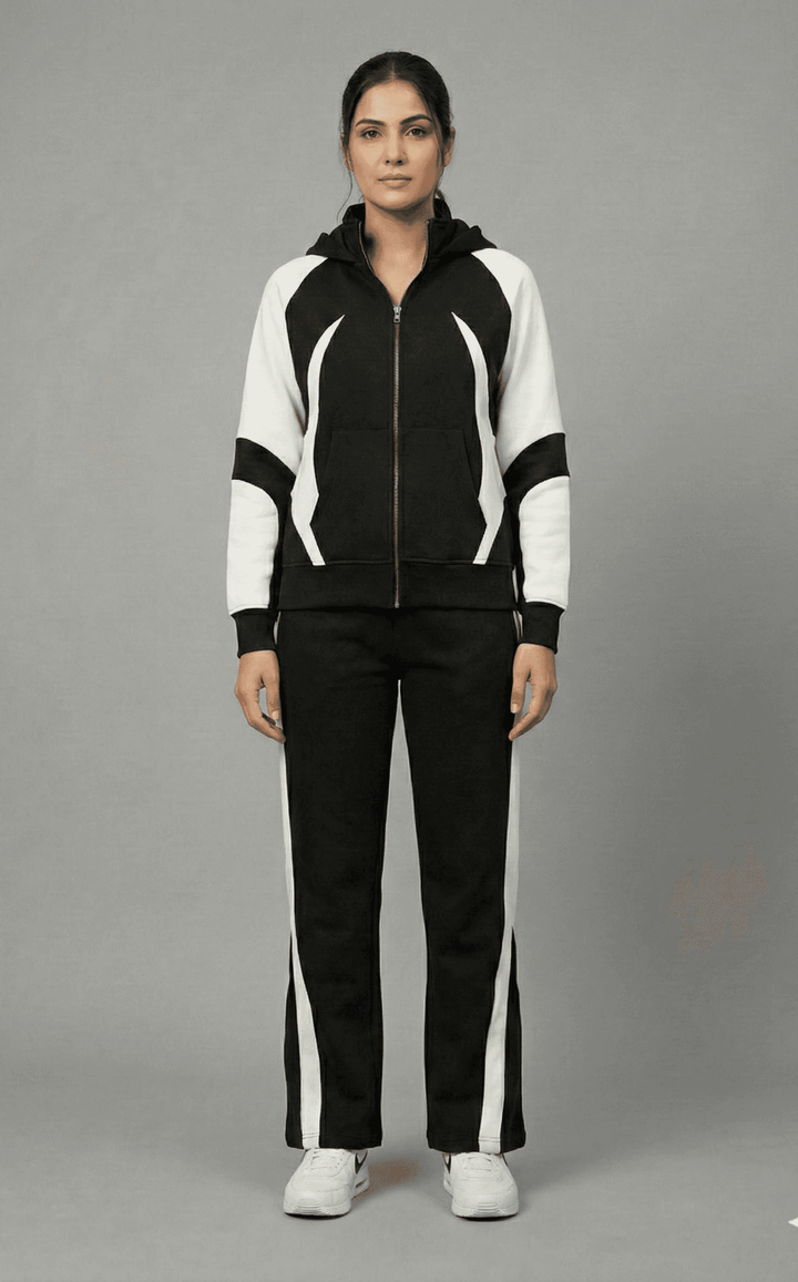 Risate women's monochrome tracksuit set featuring a zip-up jacket and matching pants for a stylish look