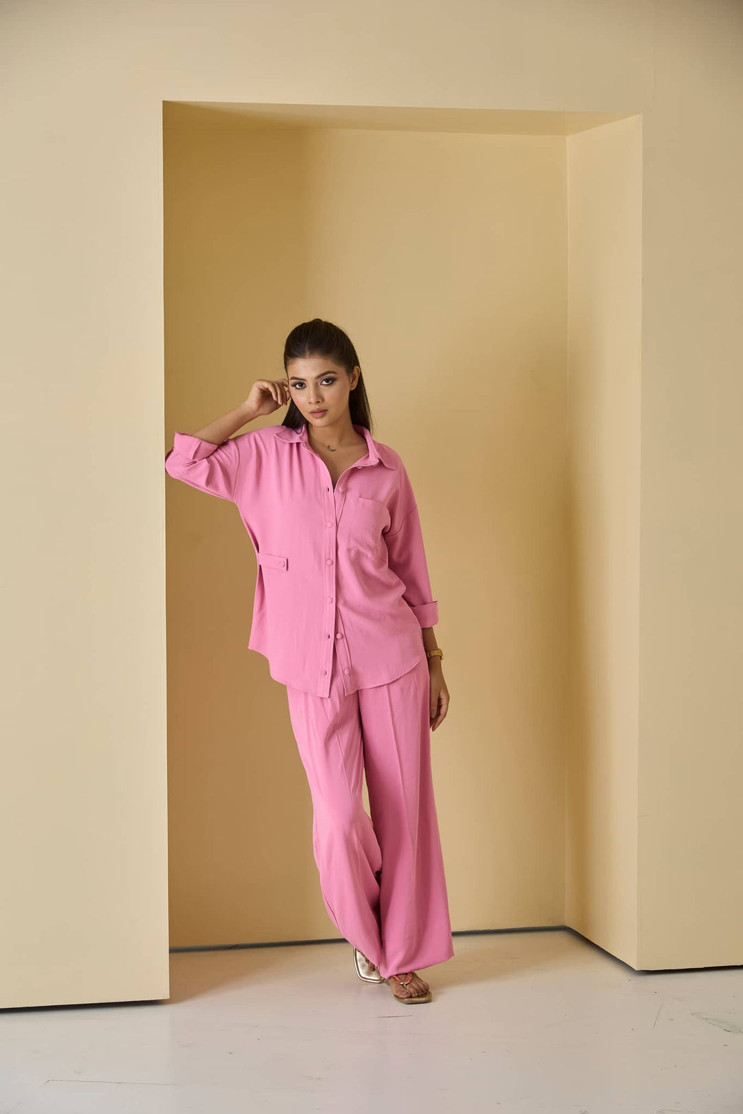 Risate women's pink co ord set featuring a button-up shirt and wide-leg pants for a chic look