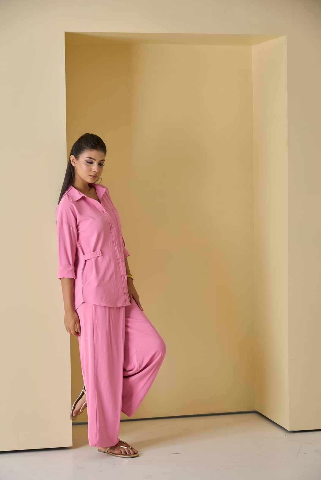 Stylish women's pink co ord set featuring a relaxed shirt and wide-leg pants