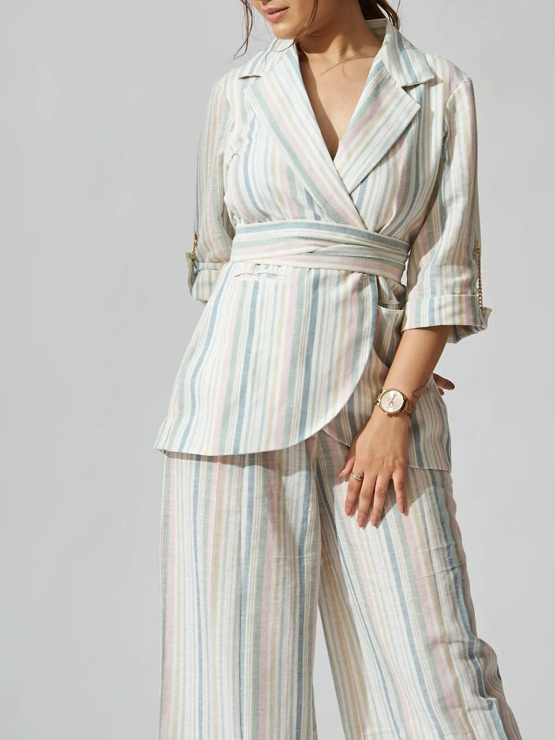 Risate women's striped linen blazer set featuring a wrap design and wide-leg pants for a stylish look