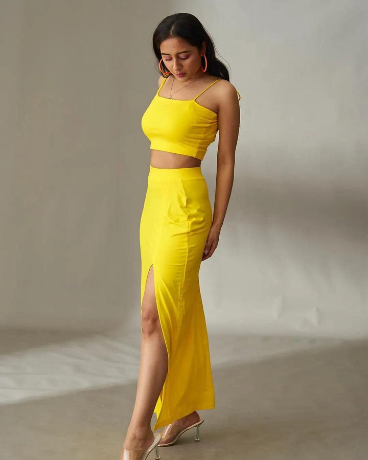Risate women's summer co ord sets featuring a yellow crop top and high-slit maxi skirt