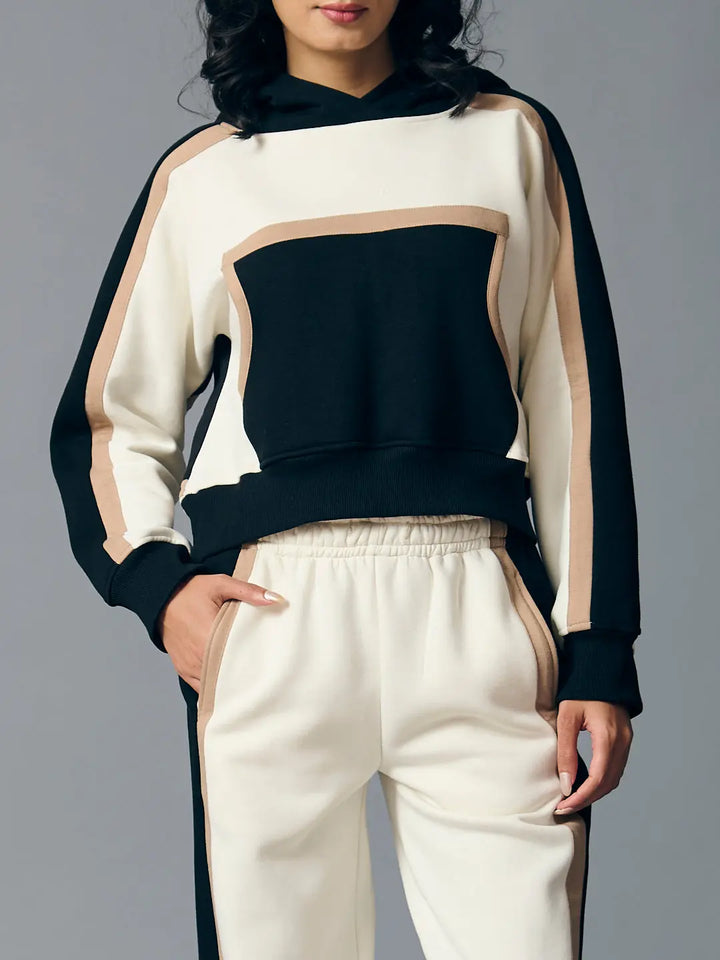 Risate women's two piece western set featuring a stylish hooded crop top and matching pants in black and beige