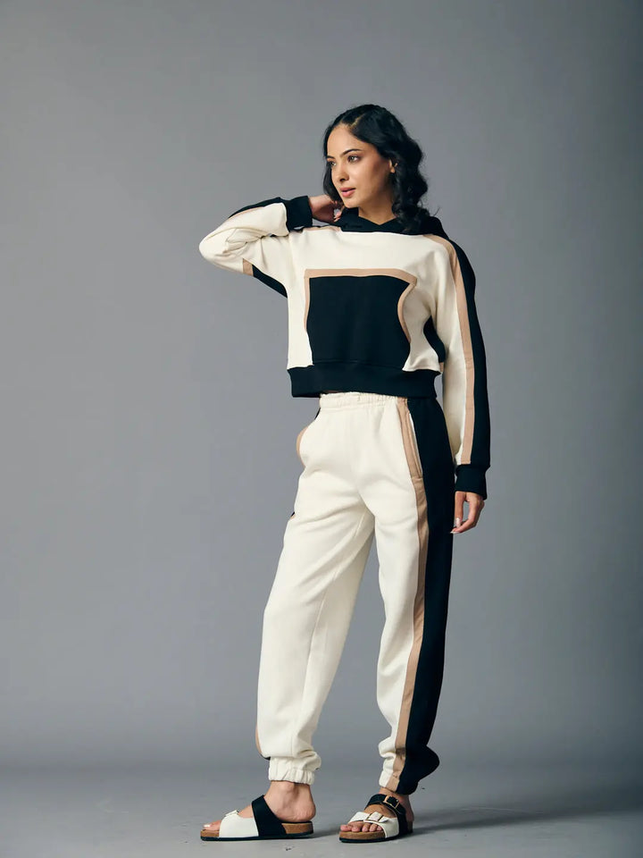 Risate women's two piece western set featuring a black and white cropped hoodie with matching jogger pants