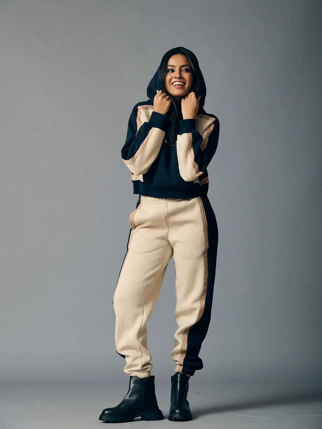 Stylish Risate women's two piece western set featuring a hooded sweatshirt and matching joggers