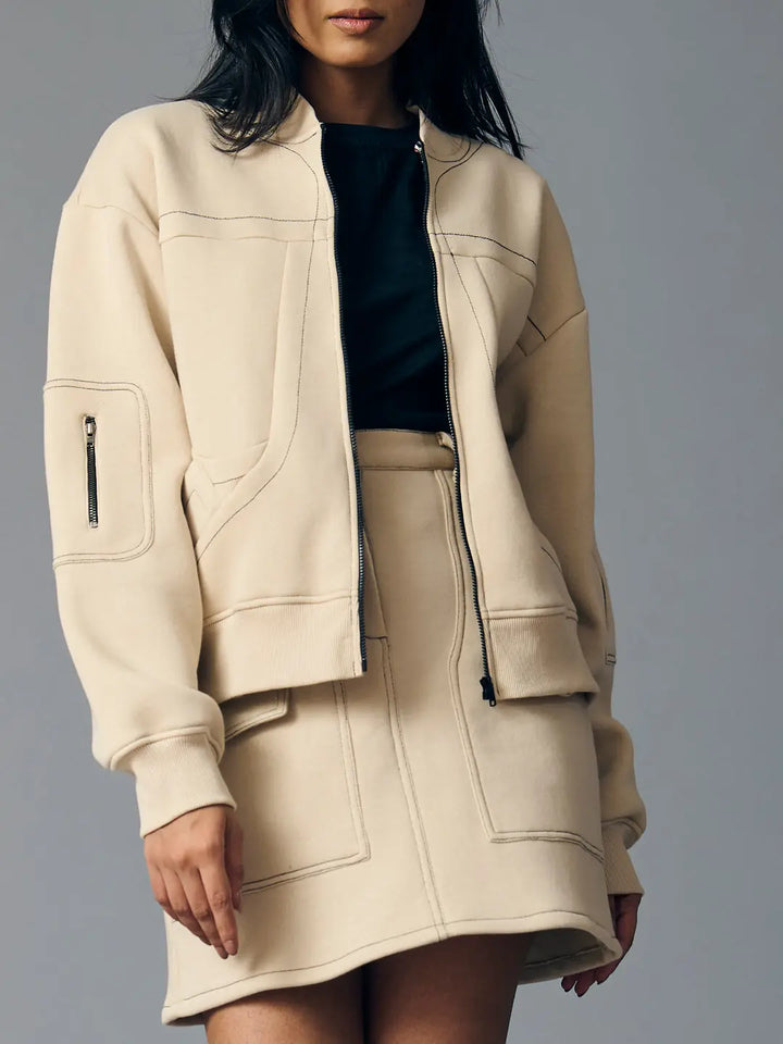 Risate women's western fleece set featuring a stylish jacket and skirt in beige for a modern look