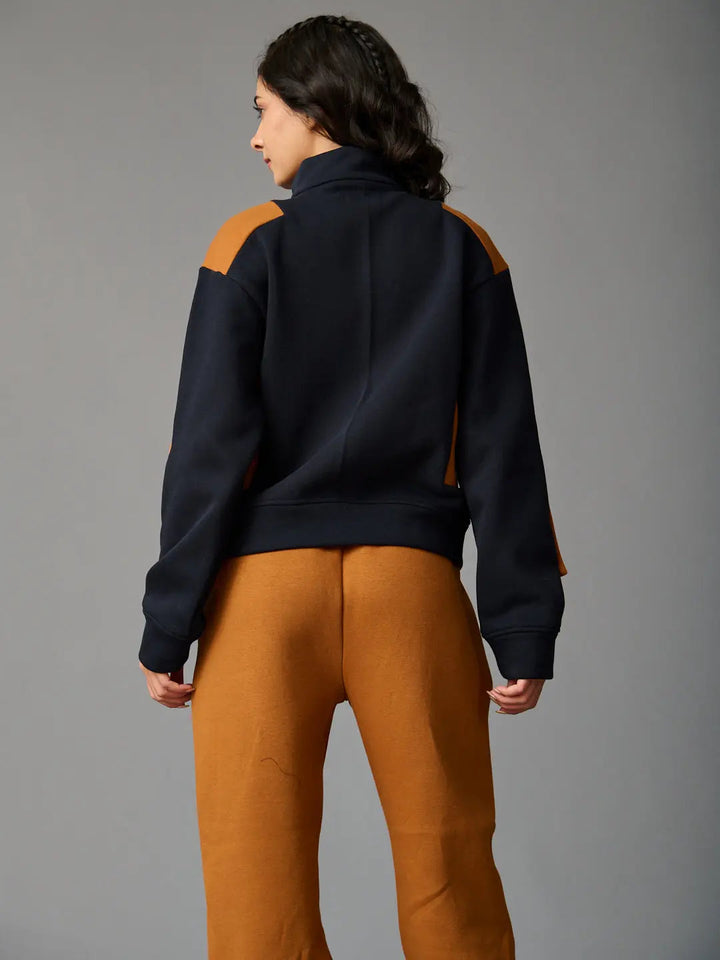 Risate women's western luxe jacket featuring a stylish design with contrasting colors and a modern fit
