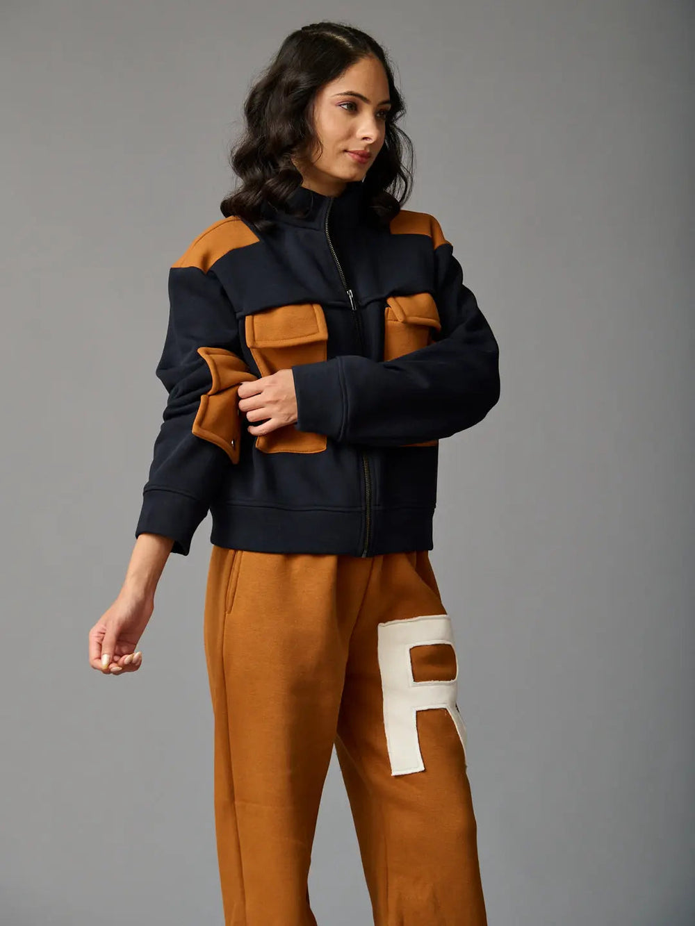 Risate women's western luxe jacket in navy and brown with stylish pockets and a modern fit