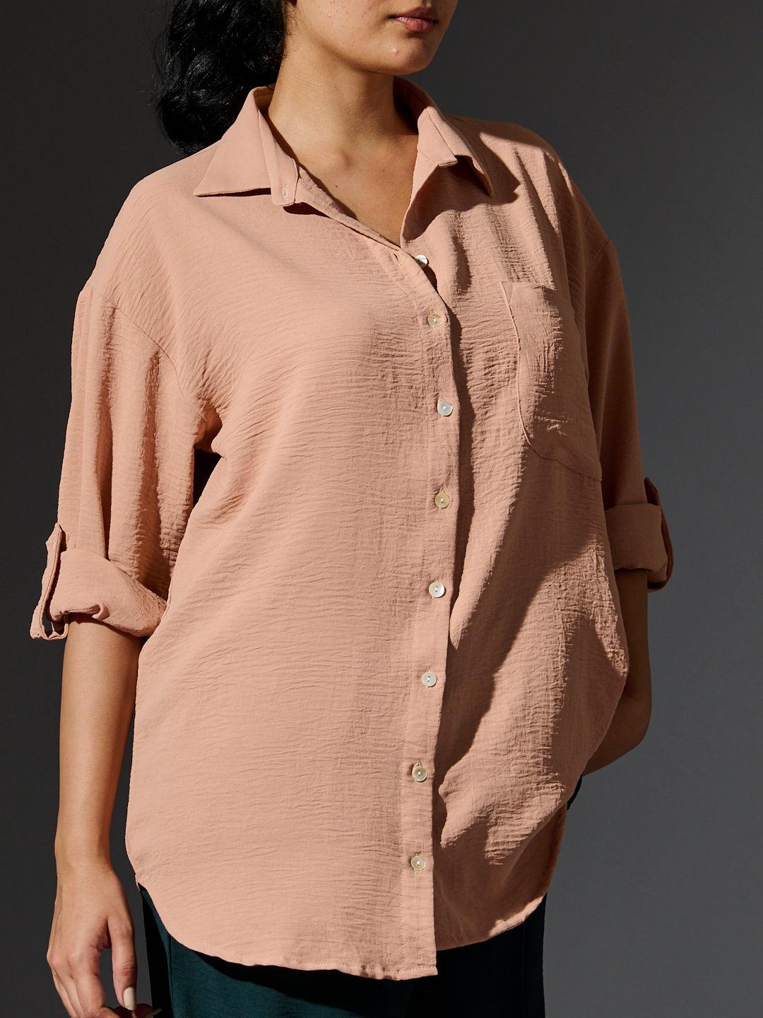 Risate women's western shirts in soft peach color with button-down design and rolled sleeves