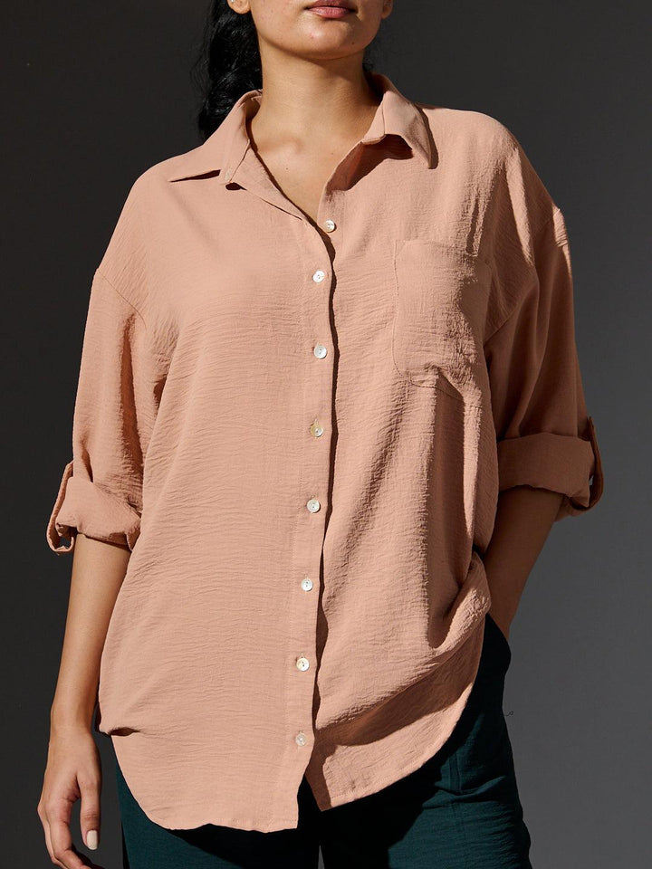 Risate women's western shirts in blush color with button-down closure and rolled sleeves