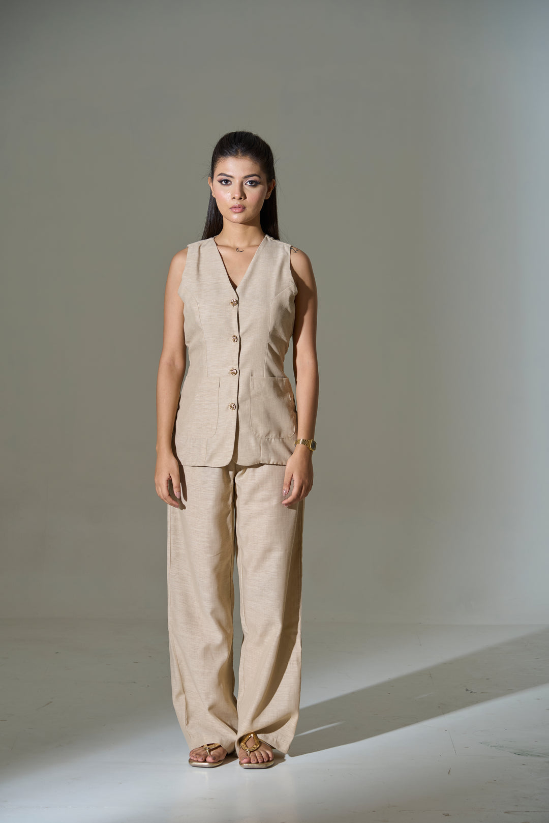 Risate women's western wear set in beige with a sleeveless button-up top and wide-leg pants