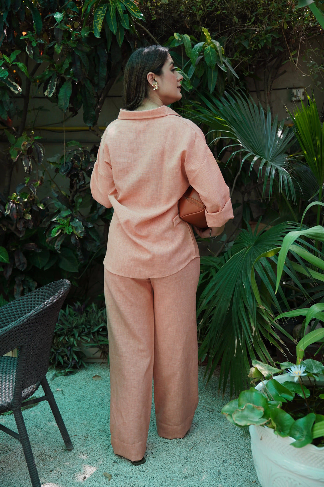 Risate women's western wear set in soft peach color featuring a relaxed shirt and wide-leg pants