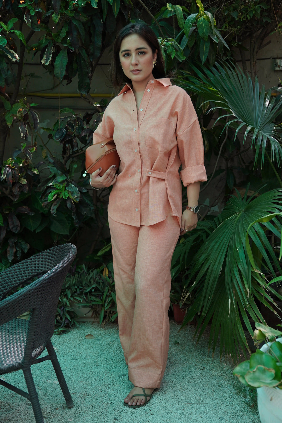 Risate women's western wear set in pastel orange with stylish button-up top and matching trousers