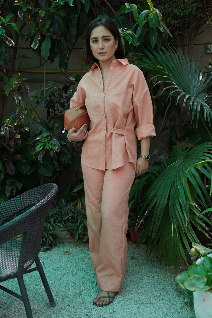 Risate women's western wear set in pastel orange with stylish button-up top and matching trousers