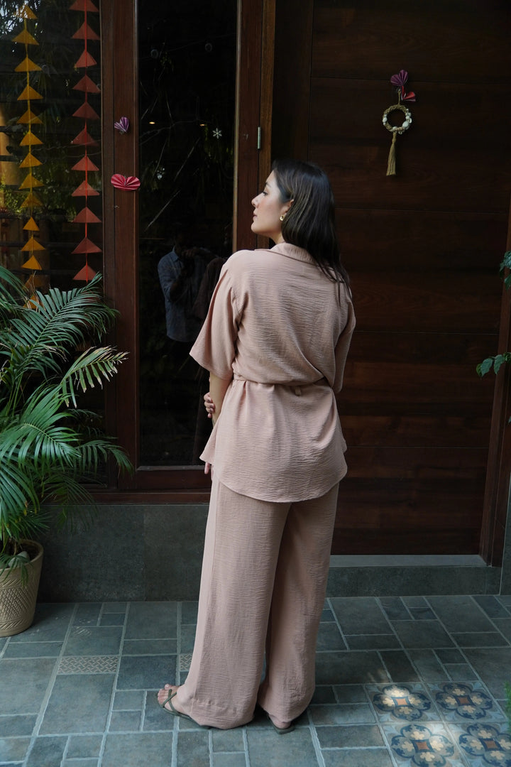 Pink women's western wear set by Risate featuring loose fit, soft material and relaxed silhouette from the back