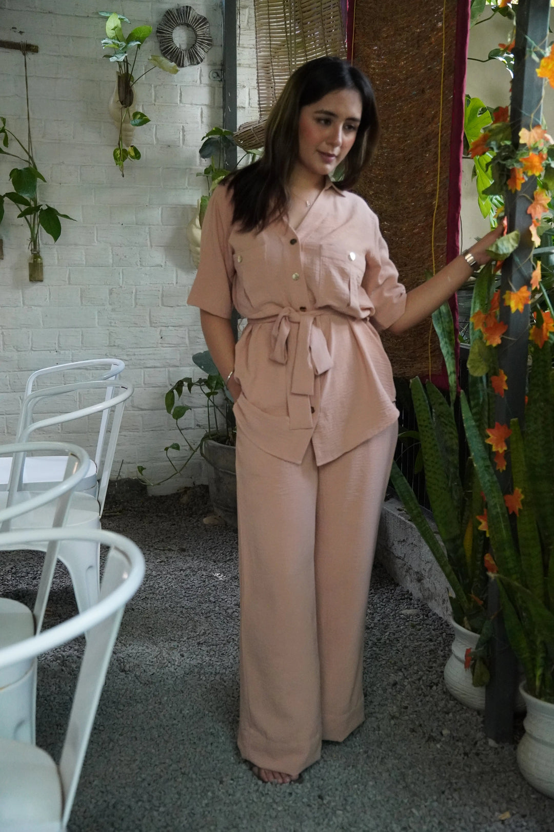 Risate women's western wear set in soft pink, featuring a belted shirt and wide-leg pants, perfect for casual outings