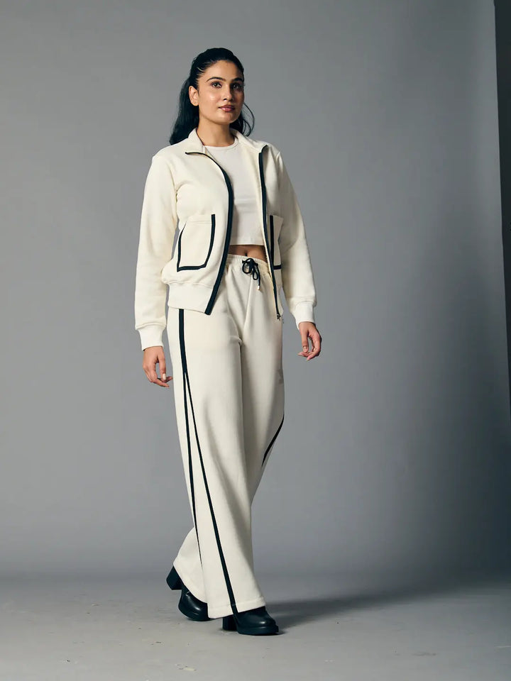 Women's zipper coord set from Risate featuring a stylish hoodie and wide-leg pants