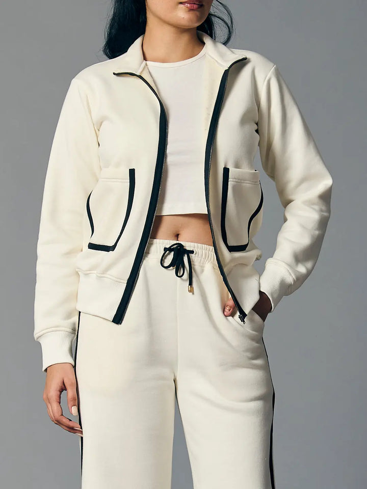 Risate women's zipper coord set in cream with black detailing and cropped top
