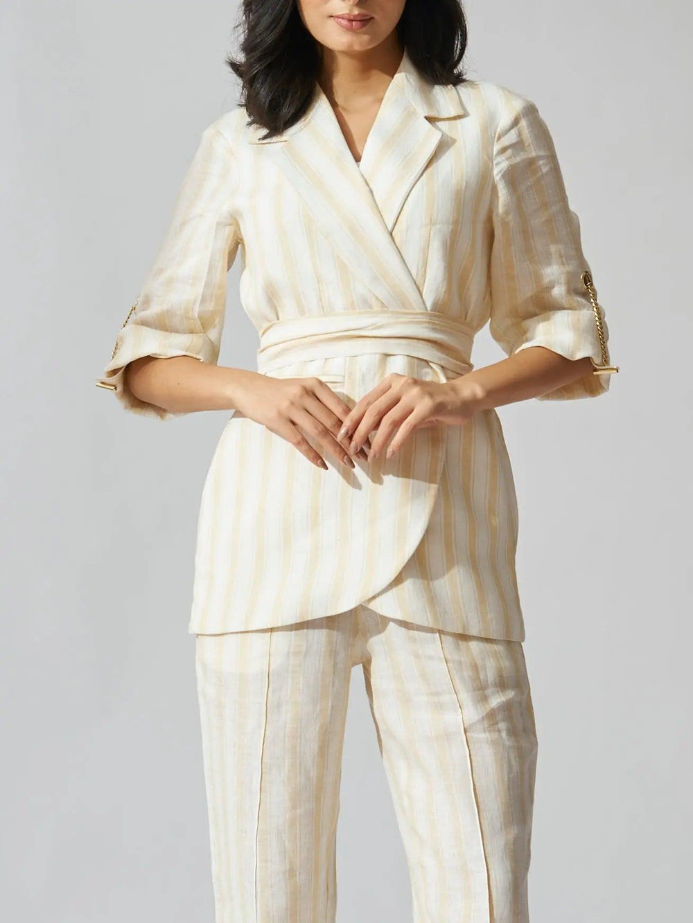 Yellow striped linen blazer set for women featuring a belted waist and stylish design