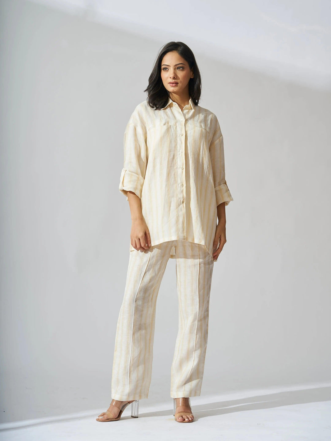 Yellow stripes linen coord set for women featuring a stylish button-up shirt and matching pants