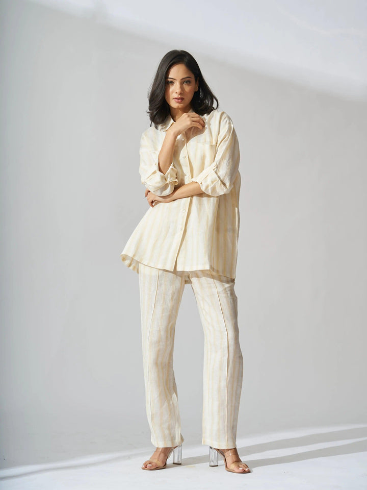 Yellow stripes linen coord set for women featuring a relaxed shirt and matching pants